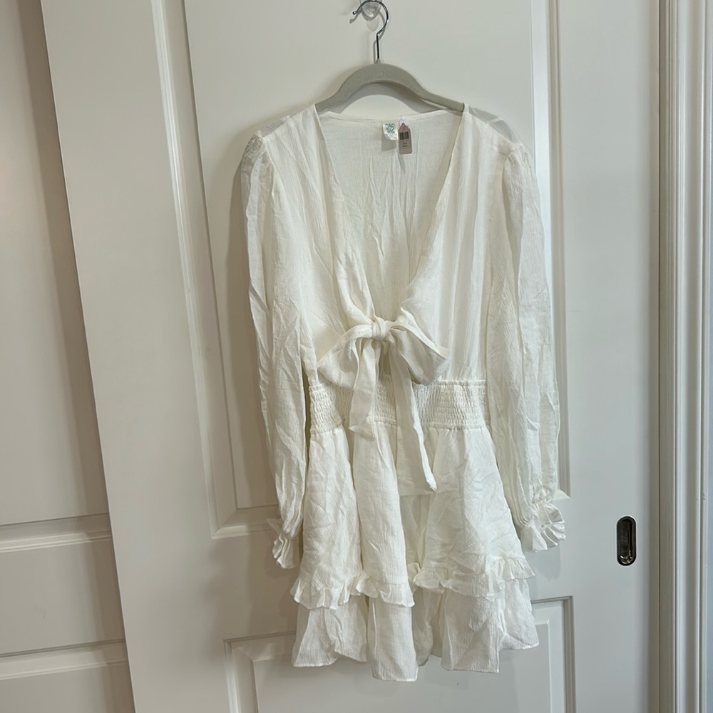 White Dress with front tie and ruffle sleeves!
